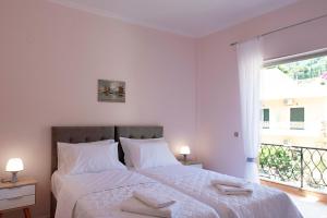 A bed or beds in a room at T8 APARTMENT ON THE BEACH