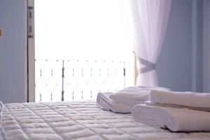 A bed or beds in a room at T8 APARTMENT ON THE BEACH