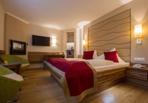 Voodi või voodid majutusasutuse Hotel König toas