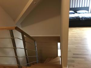 Posteľ alebo postele v izbe v ubytovaní Apartament Beige