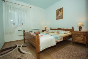 Posteľ alebo postele v izbe v ubytovaní Villa Eagle + 34 fotografií