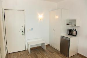 Kuchyň nebo kuchyňský kout v ubytování Blue Sea Hotel