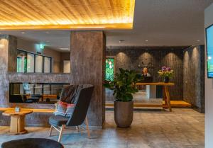 Istumisnurk majutusasutuses Stadtvilla Schladming Boutiquehotel