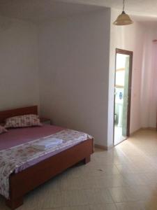 Postel nebo postele na pokoji v ubytování Hotel Moris