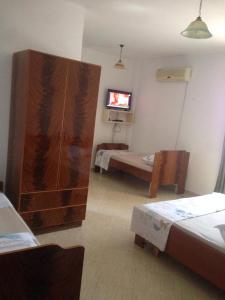 Postel nebo postele na pokoji v ubytování Hotel Moris