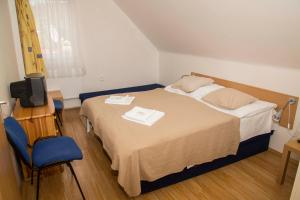 Katil atau katil-katil dalam bilik di hotel U lip Trojanovice