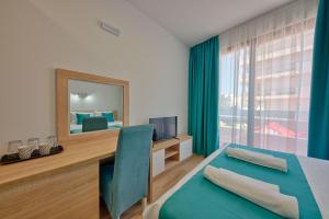 TV a/nebo společenská místnost v ubytování Hotel Obala