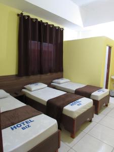 En eller flere senge i et værelse på Hotel Biz a 8 minutos do Brás, a 15 minutos da 25 de março e a 8 minutos do Bom retiro