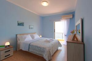 A bed or beds in a room at T8 APARTMENT ON THE BEACH
