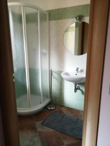 Ett badrum på Donna Violante Porto Corallo Affittacamere