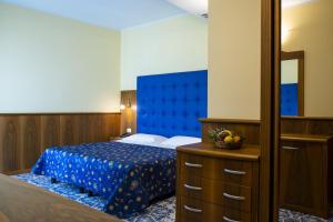 Postel nebo postele na pokoji v ubytování Hotel Panoramic