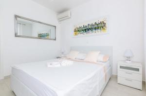 Postel nebo postele na pokoji v ubytování Villa Ivanka