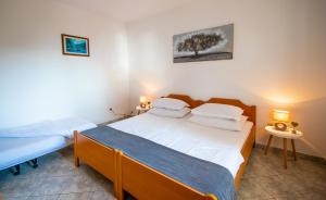 Postel nebo postele na pokoji v ubytování Apartment Franić