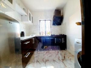 Dapur atau dapur kecil di CG Apartments Metro