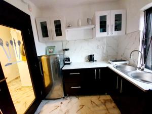 Dapur atau dapur kecil di CG Apartments Metro