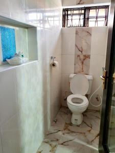 Bilik mandi di CG Apartments Metro