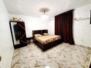 Katil atau katil-katil dalam bilik di CG Apartments Metro