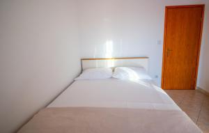 Postel nebo postele na pokoji v ubytování Apartment Franić