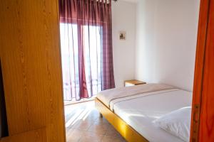 Postel nebo postele na pokoji v ubytování Apartment Franić