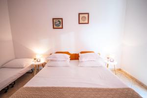 Postel nebo postele na pokoji v ubytování Apartment Franić