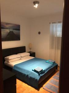 Llit o llits en una habitació de Apartment F24 Stignano Favaco
