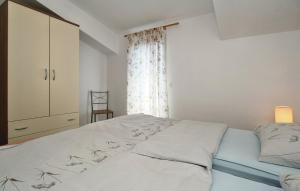 Postel nebo postele na pokoji v ubytování Apartments Vesna