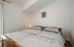 Postel nebo postele na pokoji v ubytování Apartments Vesna