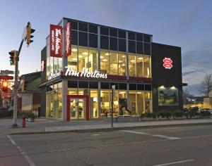 a fast food store on a street corner with a traffic light at Doucet Guesthouse in Hamilton