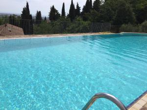 The swimming pool at or close to Lady Frantoio Toscano