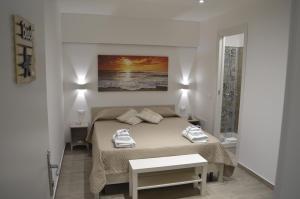 Кровать или кровати в номере Casa Catalano