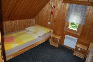 Un ou plusieurs lits dans un hébergement de l'établissement Chata Brestová,Zuberec