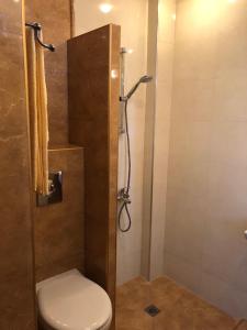 Ванная комната в Family Hotel Radiana
