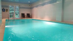 
Bazén v ubytování Pension Aspen Harrachov nebo v jeho okolí
