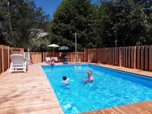 The swimming pool at or close to Camping L'Orée des Cévennes