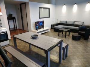 TV a/nebo společenská místnost v ubytování Marilia apartment