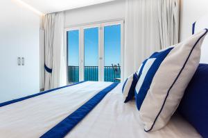 Postel nebo postele na pokoji v ubytování Hotel Bristol