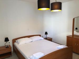 Postel nebo postele na pokoji v ubytování Adriatic House