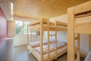 Postel nebo postele na pokoji v ubytování Sport- und Ferienhaus Don Bosco + 26 fotografií