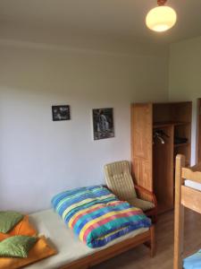 Posteľ alebo postele v izbe v ubytovaní Villa jumper widok na całe Tatry łazienka nie jest w pokoju i jest wspólna z innymi ludźmi