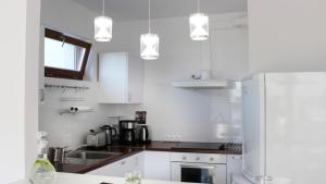 Kuchyňa alebo kuchynka v ubytovaní Apartament Reda