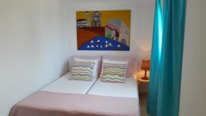Posteľ alebo postele v izbe v ubytovaní Apartmani AD Hvar