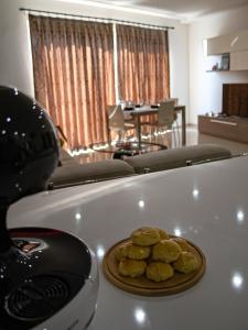 a plate of food on the front of a car at Couple's Getaway in Is-Swieqi
