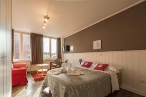 Postel nebo postele na pokoji v ubytování Hotel Leopold