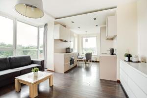 Η κουζίνα ή μικρή κουζίνα στο Zalgirio apartment