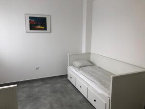 Voodi või voodid majutusasutuse Rezeda Apartman toas