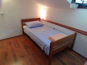 Postel nebo postele na pokoji v ubytování APARTMAN Nikolina