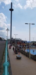 a group of people standing around a water park at Andorra Guest Accommodation in Brighton & Hove