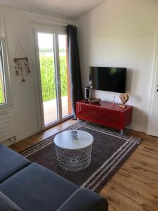 a living room with a couch and a coffee table at Les Moucherons in Avenches