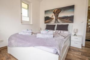 Posteľ alebo postele v izbe v ubytovaní Luxuriöse Penthaus Wohnung
