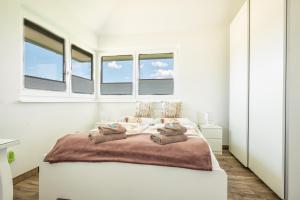 Posteľ alebo postele v izbe v ubytovaní Luxuriöse Penthaus Wohnung
